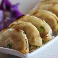 Pot Sticker · A popular Asian dumpling. Filled it with minced pork, seasoned with ginger and green onion. ...