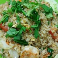 Thai Fried Rice · 1 of the most famous dishes in Thailand. Aroma with garlic, onions, eggs, tomatoes, peas, ca...