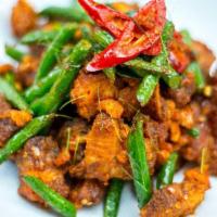 Complicated Curry · Stir fried sizzling spiciest house made habanero curry, blended with coconut milk, green bea...