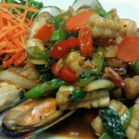 Spicy Seafood with Basil Leaves · Mixed of shrimps, mussels, calamari, and scallops in chili fresh crush garlic, onion, bell p...