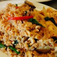 R2. Basil Fried Rice · Choice of meat with rice, sauteed in delicious basil sauce with mushrooms, bell pepper, and ...