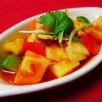 AC4. Thai Sweet and Sour · Served with choice of meat with pineapple, tomatoes, onion and green onions in sweet and sou...