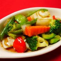 AC12. Mixed Vegetables · Choice of meat and mixed vegetables in flavorful house sauce.