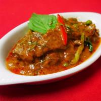CU1. Panang Curry · Choice of meat in creamy coconut milk, peppers, and flavorful Panang curry.