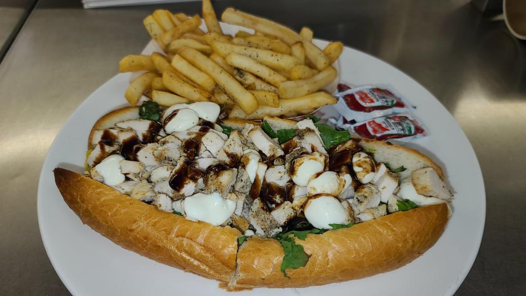 Chicken Pesto Sandwich · Grilled chicken, fresh Buffalo mozzarella, roasted and hot peppers, homemade pesto sauce, balsamic reduction.