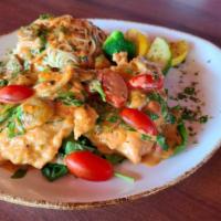Chicken Florentine Madeira · Chicken breast sauteed with cherry tomatoes, mushrooms, shallots and fresh spinach and cream...