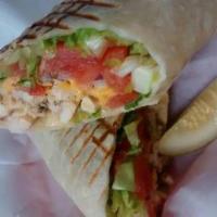 Buffalo Chicken Wrap · Grilled chicken, cheddar cheese, lettuce, tomatoes, red onions and Buffalo sauce. Comes with...