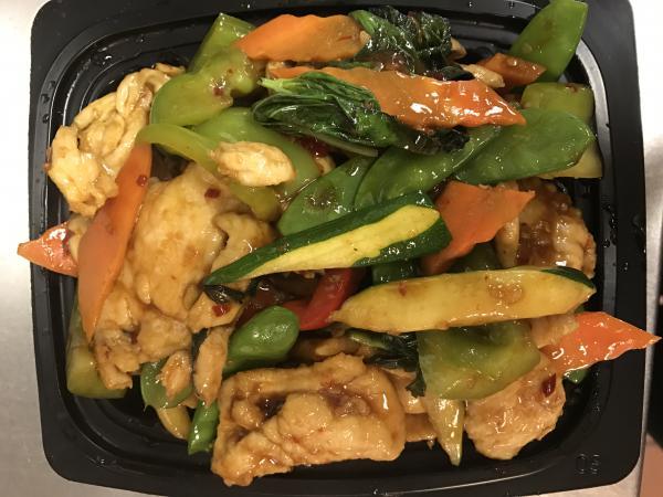 Thai Basil Chicken · Sliced white meat in a chili garlic sauce with zucchini, mushroom, pepper and sweet basil leaves. Hot and spicy.