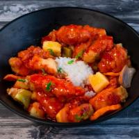 45. Sweet and Sour Chicken · Diced chicken, marinated, batter-dipped, deep fried until golden brown, with carrot, pineapp...