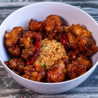 53A. General Tao's Chicken · Cubed chicken, marinated, batter dipped, deep fried until golden brown glazed with tasty swe...