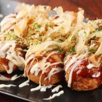 Takoyaki · Five fried octopus balls with anori okonomi sauce, creamy Japanese mayo and bonito flakes