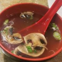 Clear Soup · Chicken broth, scallions, mushrooms and fried onions.