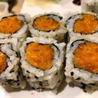 Spicy Salmon Roll · Chopped spicy salmon, wrapped inside out with tobiko. Raw. Spicy.