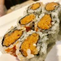 Spicy Tuna Roll · Chopped spicy tuna, wrapped inside out with tobiko. Raw. Spicy.