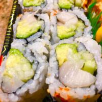 Yellowtail Special Roll · Raw. Yellowtail, scallion, cucumber and avocado wrapped inside out with tobiko. 
