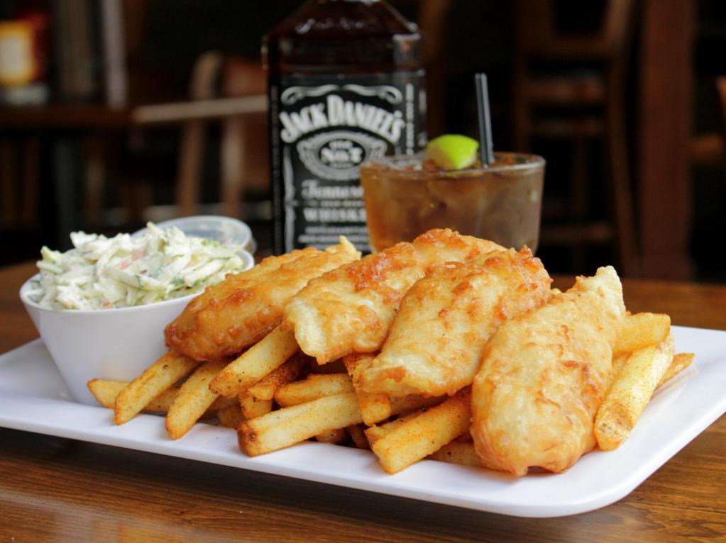 IPA Beer Battered Fish · Hand battered wild-caught cod fillets served with coleslaw, natural cut fries, and house made tartar.