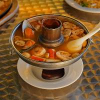 26. Poh Tak Soup · Hot pot only. Spicy combination seafood soup with shrimps, scallops, squids, mussels and fis...