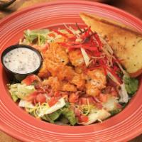 Buffalo Chicken Salad · Fresh greens with cheddar-jack cheese, diced tomatoes, bacon, tortilla strips, and your choi...