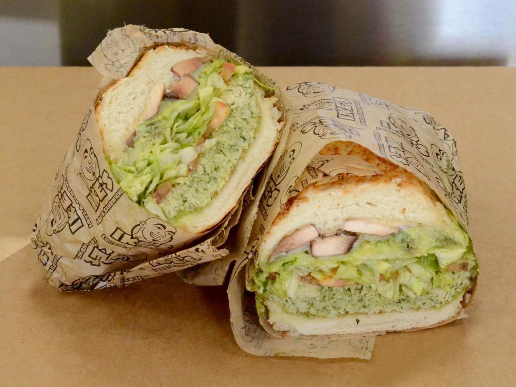 5.  Spiffy Tiffy Sandwich · Halal chicken, grilled mushrooms, avocado, pesto, provolone and pepper Jack.