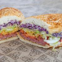 91. Paul Reubens Sandwich · Pastrami, French dressing, purple slaw and Swiss. Served with dirty sauce, lettuce and tomato.