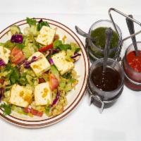 Tofu Mung Salad · Special Indian salad with mung daal, cucumbers and chopped onions with tangy dressing and to...