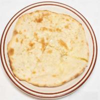 Cheese Naan · Leavened bread, stuffed with cheese and baked in the tandoor.