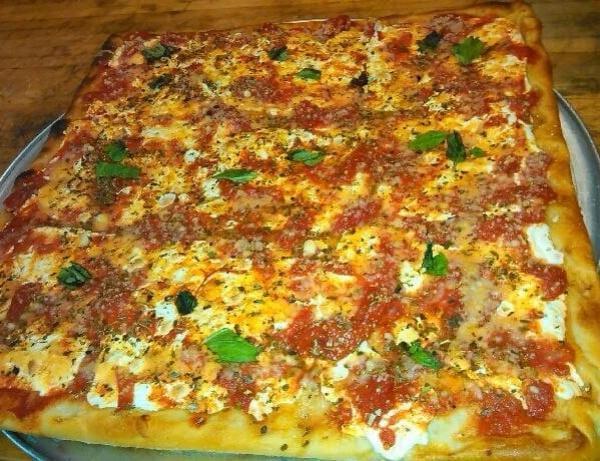 Grandma's Pizza · Thin square pan pizza with fresh mozzarella, plum tomatoes and herbs.