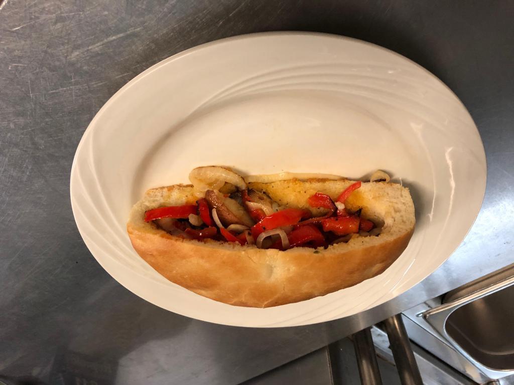 10” ITALIAN HOTDOG · Mustard, ketchup, peppers, onions & potatoes in a homemade half moon bread
