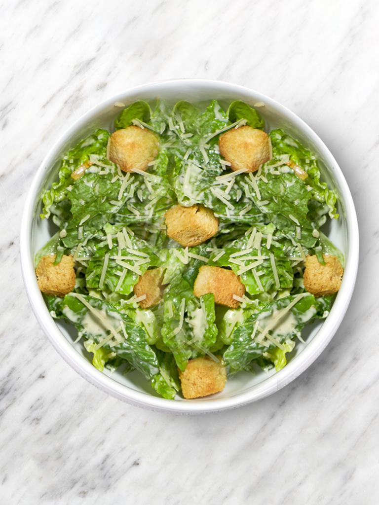 Side Caesar Salad · Romaine, Parmesan, house-made croutons, Caesar dressing.