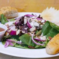 Verde Salad · Mixed leaves, apple, almonds, red onions, Gorgonzola, and balsamic vinaigrette.