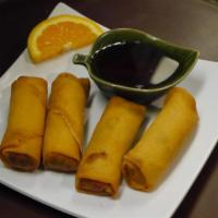 2. Fried Spring Roll · Fresh vegetable, carrots taro, thread mung bean noodles, black fungus mushrooms wrapped in s...