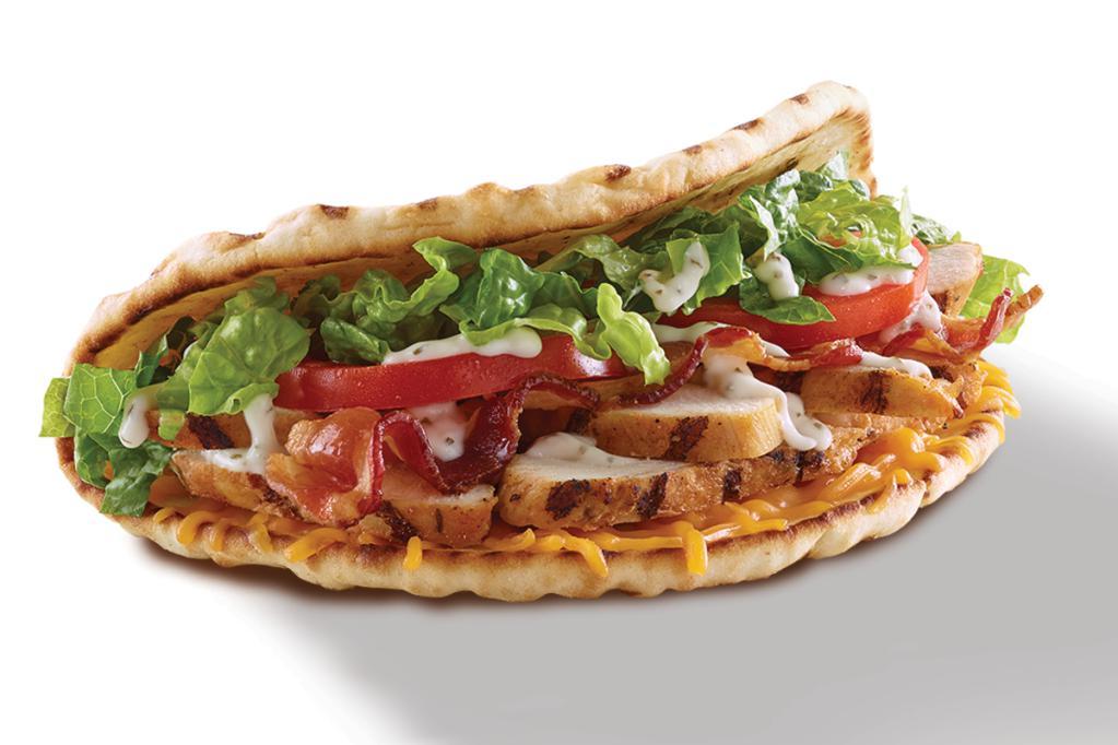 Chicken Bacon Ranch Flatbread · Grilled chicken, bacon, tomatoes, romaine, cheddar & lite ranch.