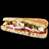 Chicken Caprese Sandwich · Grilled chicken, fresh mozzarella, parmesan, tomato, balsamic glaze & pesto pressed to perfe...