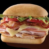 Ultimate Club Sandwich · Ham, turkey, bacon, swiss, shredded parmesan, tomatoes, romaine & chipotle mayo on ciabatta....
