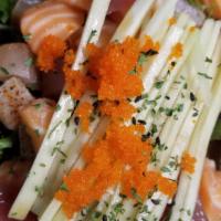 Sashimi Salad · Tender chucks of mixed fresh fish sashimi over a bed of greens with Ponzu dressing