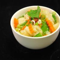 Wonton Soup · Ground chicken stuffed in wonton wraps with clear soup.