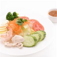 Thai Pepper Salad · Shrimp, chicken, hard boiled egg, lettuce, onion, tomato, cucumber and peanut sauce dressing.