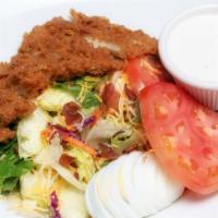 Crispy Chicken Salad · Regular or buffalo style. Our tender fried chicken strips with a hard boiled egg, bacon, shr...