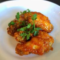 Soy Garlic Chicken Wing · Fried chicken wings in house soy garlic sauce.