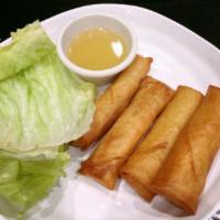 Spring Roll · Lean ground chicken and vegetables fried in a crispy roll. Served with sweet and sour fish s...