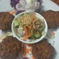 2. Fish Cake · Deep fried fish cake blended in curry paste, lemongrass and green beans served with peanut m...