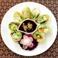 10. Fresh Vegetarian Summer Rolls · Rice paper with vermicelli noodles and fresh vegetables served with hoisin sauce and ground ...