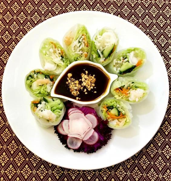 11. Fresh Shrimp Spring Rolls · Rice paper wrapped with shrimps, vermicelli noodles, and fresh vegetables served with hoisin sauce and ground peanuts.