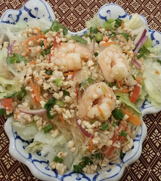 23. Silver Noodles Salad · Silver noodles mixed with shrimp, ground chicken, mushrooms, onions, cilantro and Thai spicy lime dressing. Spicy.