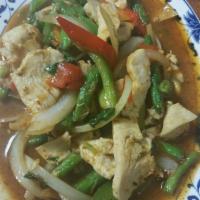 45. Pad Prig Khing Chicken · Stir fried chicken or tofu with string beans, chili paste, ground peanuts, tamarind sauce, f...