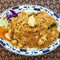 67. Pad Thai · Pan fried Thai noodles with chicken or prawn, fried tofu, ground peanuts, dried radish, bean...