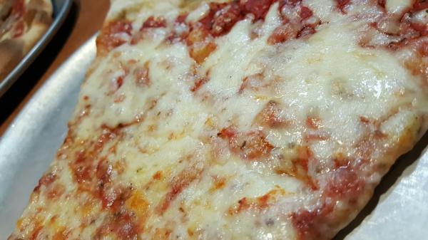 Ruckus White Pizza · Mozzarella, ricotta, roasted garlic, extra virgin olive oil and fresh basil. Vegetarian.