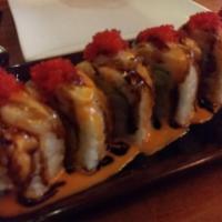 Wolfpack Roll · Shrimp tempura, yellowtail and avocado topped with seared scallops, red tobiko, spicy mayo a...