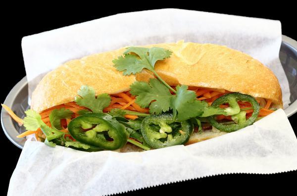 Vegetarian Sandwich · Banh mi chay. Mixed vegetables stir fried with tofu with special mayo sauce, pickled carrots and daikon, cilantro and jalapeno peppers. Vegetarian.