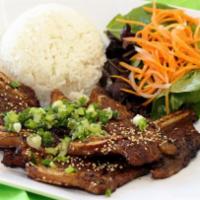 Kalbi Bowl · BBQ beef ribs. Korean kalbi BBQ ribs served with organic mixed spring salad with homemade dr...